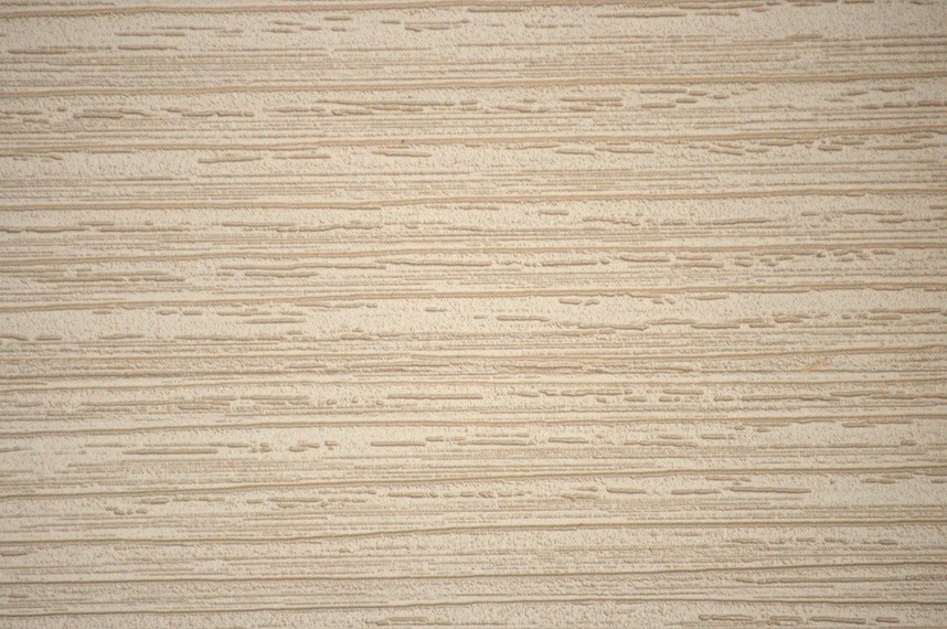 Bleached walnut, polished surface of natural light wood close-up.